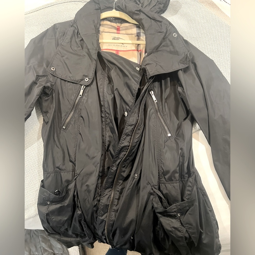 Like new Burberry rain coat.